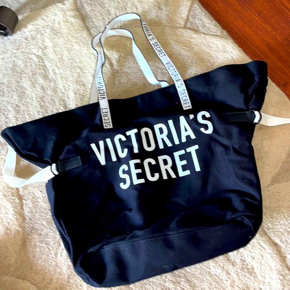 Victoria’s Secret black/white tote w side cinches &inside pocket approx 10 x 12“